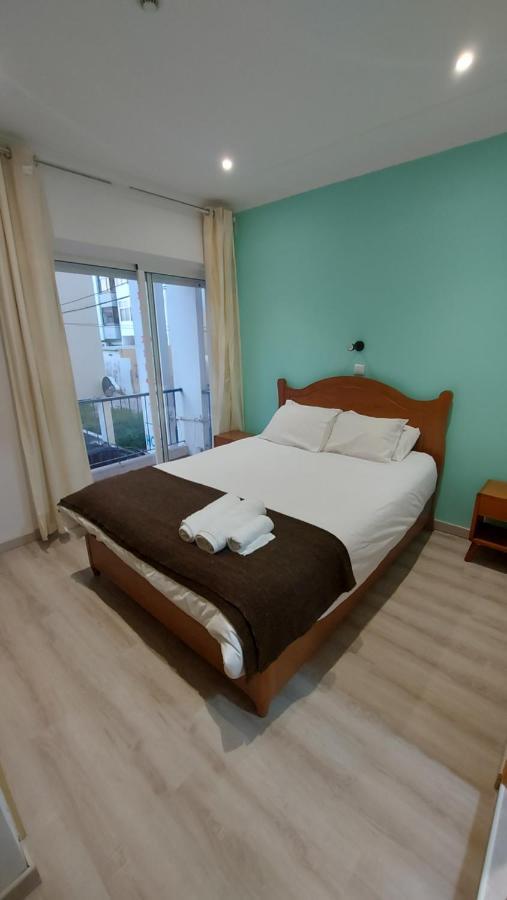 Отель Residencial Condado Фару Номер фото